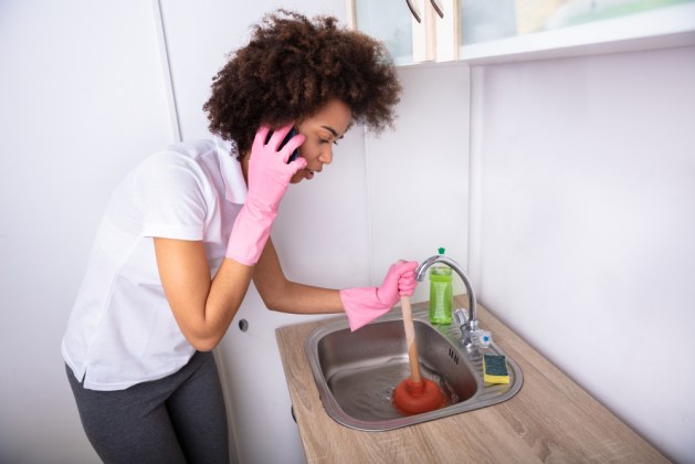 Cleaning a Smelly Drain: DIY vs. Calling the Experts